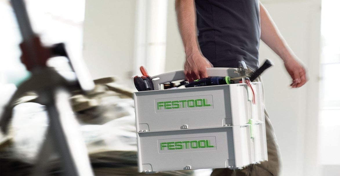 Man carrying Festool tools in toolbox-1